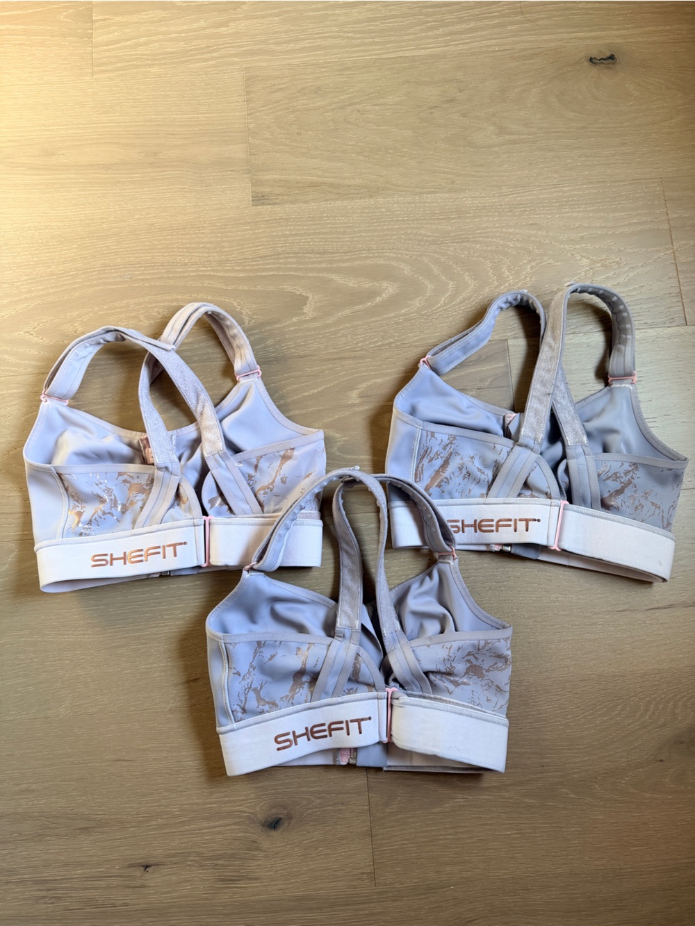 *3* SHEFIT LUXE Sports Bras with Rose Gold Accents - FAIR CONDITION - Picture 3 of 6